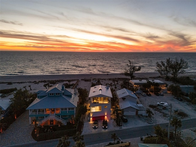 aerial view featuring a beach view and a water view