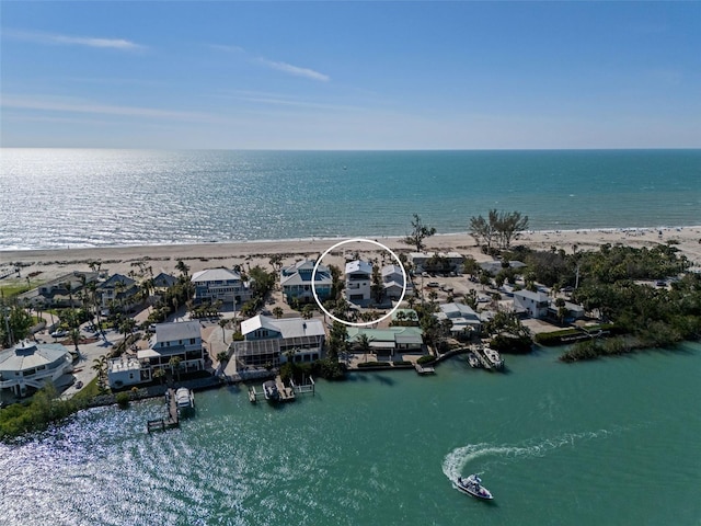 aerial view featuring a residential view and a water view