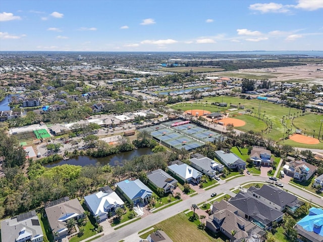 aerial view featuring a residential view and a water view