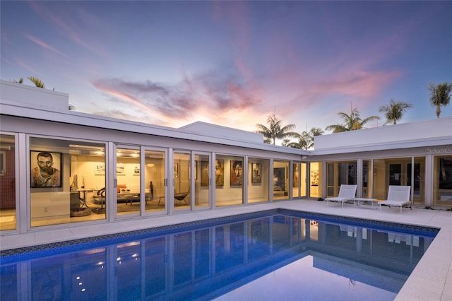 pool featuring a patio area