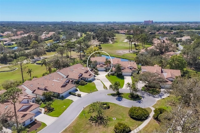 bird's eye view with view of golf course and a residential view