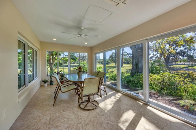 sunroom / solarium with ceiling fan