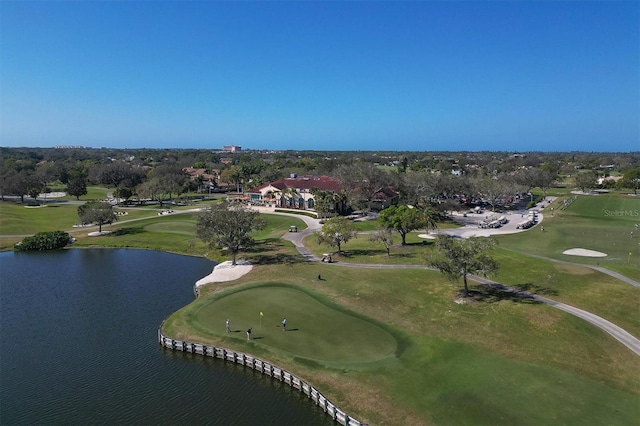 bird's eye view featuring golf course view and a water view