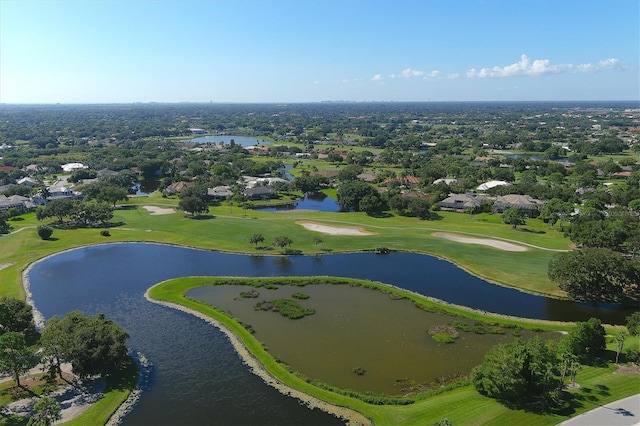 birds eye view of property featuring a water view and golf course view