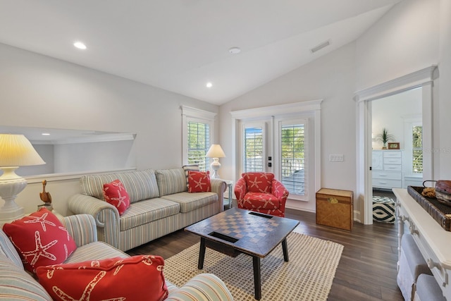 living room with dark wood finished floors, visible vents, vaulted ceiling, and recessed lighting