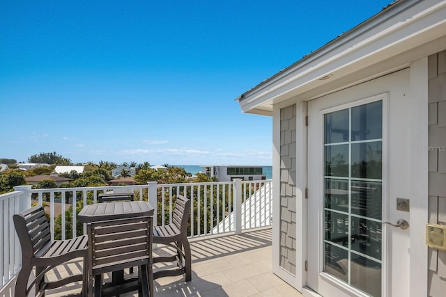 balcony featuring outdoor dining area