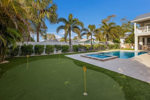 view of pool with a patio area, a fenced backyard, and a fenced in pool