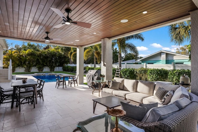 view of patio featuring a fenced in pool, a ceiling fan, a fenced backyard, an outdoor hangout area, and outdoor dining area