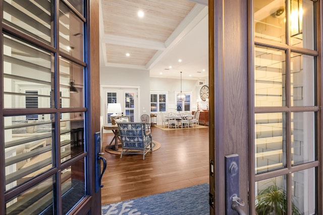 entrance foyer with beam ceiling, french doors, dark wood-style flooring, recessed lighting, and coffered ceiling