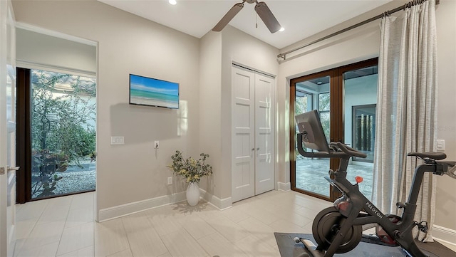 exercise room featuring recessed lighting, baseboards, and ceiling fan