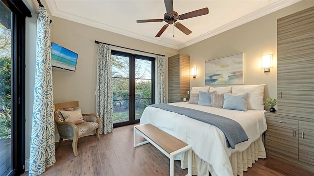 bedroom featuring access to outside, ornamental molding, ceiling fan, and wood finished floors