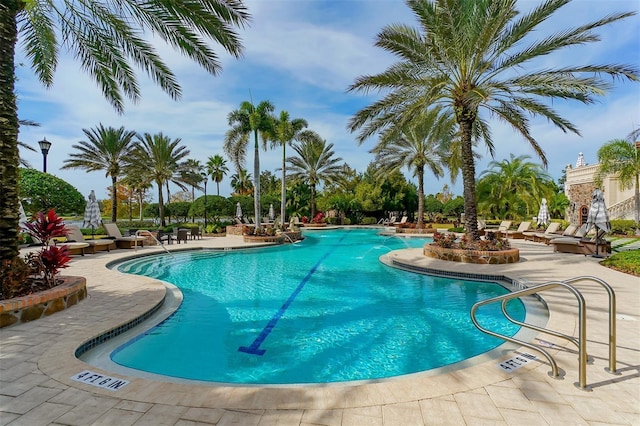 pool featuring a patio area