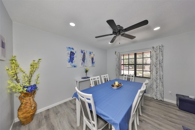 dining room with recessed lighting, ceiling fan, baseboards, and wood finished floors