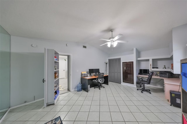 office area with lofted ceiling, light tile patterned flooring, ceiling fan, and visible vents