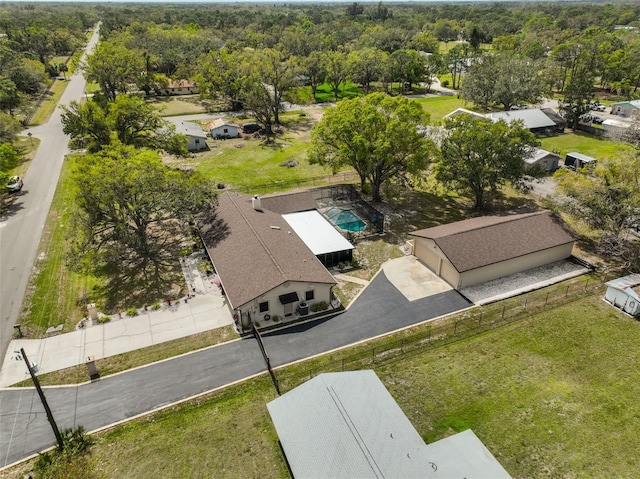 aerial view with a wooded view