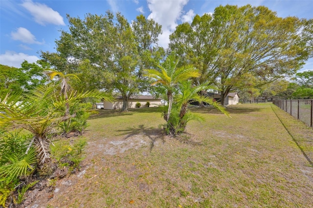 view of yard with fence