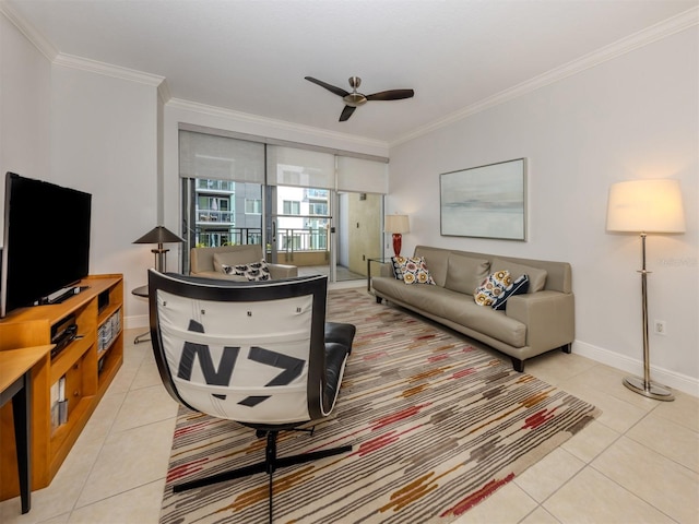 living room with ceiling fan, light tile patterned flooring, baseboards, and crown molding