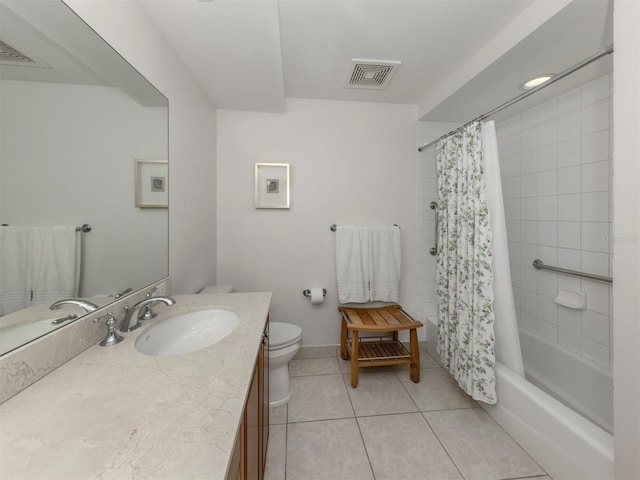 bathroom with visible vents, toilet, tile patterned flooring, shower / bath combo with shower curtain, and vanity