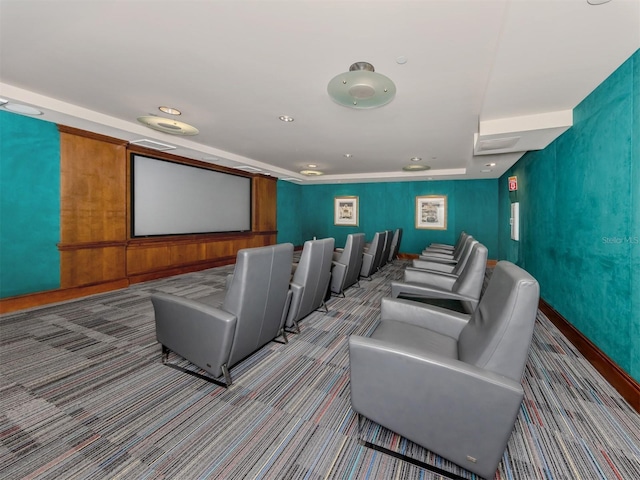 cinema room with carpet flooring and recessed lighting