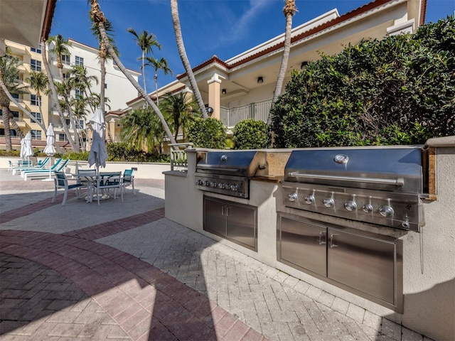 view of patio with grilling area and exterior kitchen