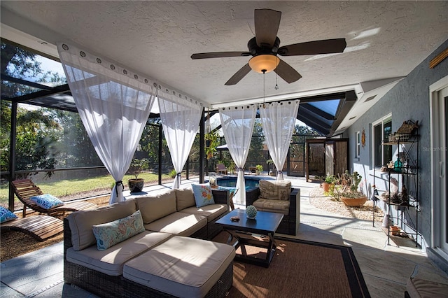 view of patio with ceiling fan, glass enclosure, an outdoor hangout area, visible vents, and a fenced in pool