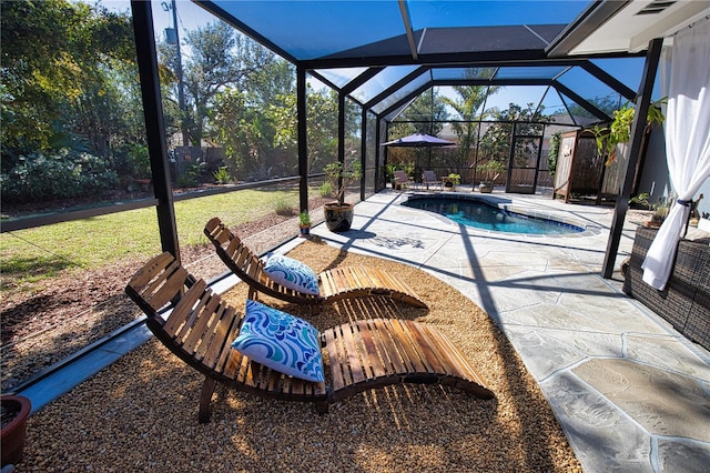 exterior space with a lanai and an outdoor pool