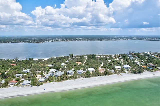 aerial view featuring a water view and a view of the beach