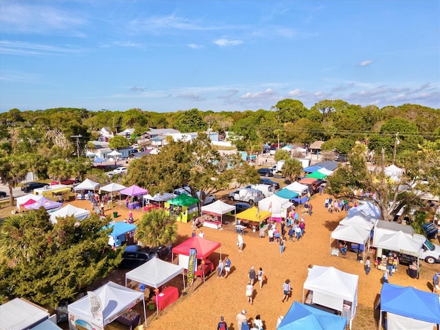 aerial view featuring a wooded view