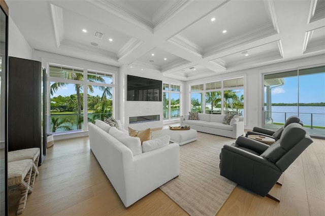 sunroom / solarium featuring a fireplace, visible vents, coffered ceiling, and beamed ceiling