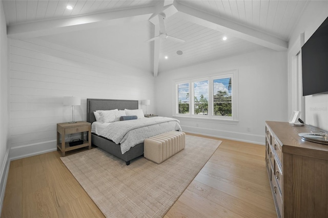 bedroom featuring lofted ceiling with beams, light wood-style floors, baseboards, and recessed lighting