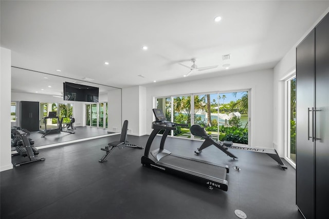 gym with plenty of natural light and recessed lighting