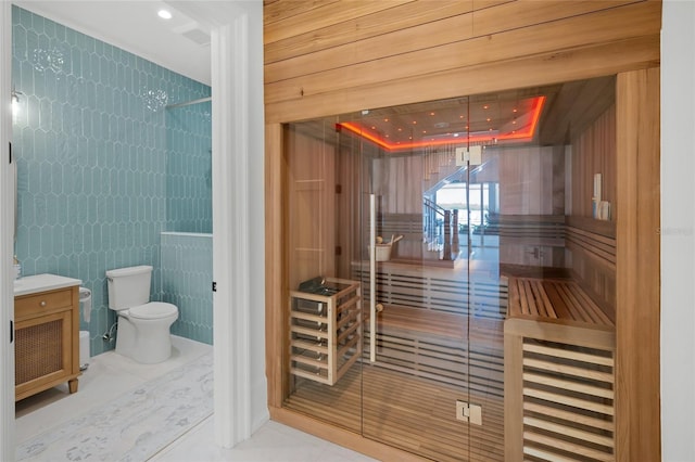 view of sauna with recessed lighting and tile patterned floors