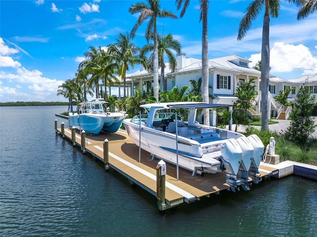 view of dock featuring a water view and boat lift