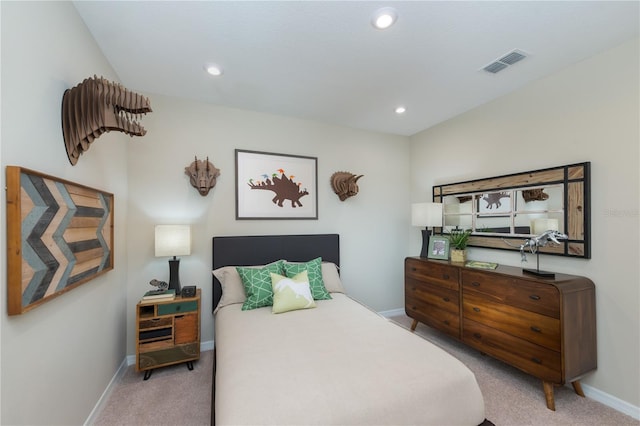 carpeted bedroom with recessed lighting, visible vents, and baseboards