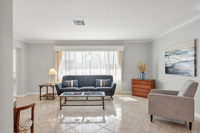 living area with baseboards, visible vents, and crown molding