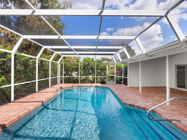 pool featuring a patio area and a lanai