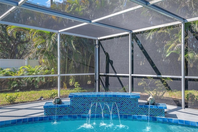 outdoor pool with glass enclosure and fence