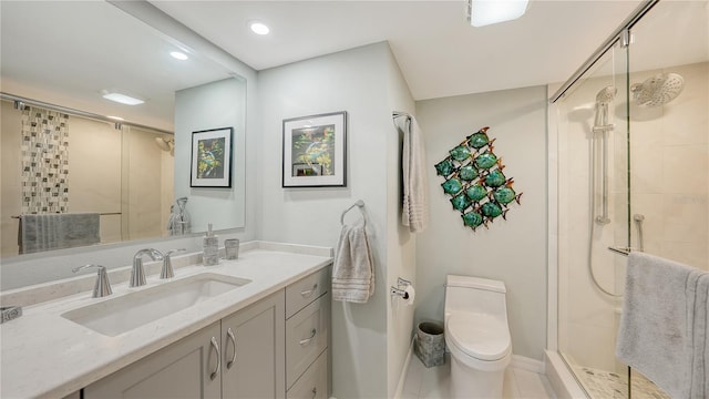 bathroom with toilet, recessed lighting, vanity, baseboards, and a shower stall