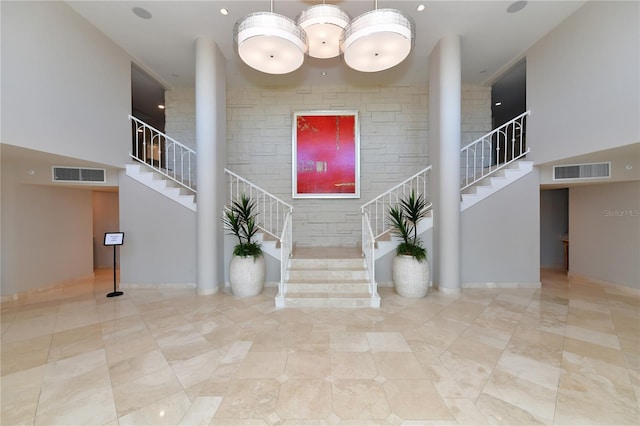 interior space featuring stairway and visible vents