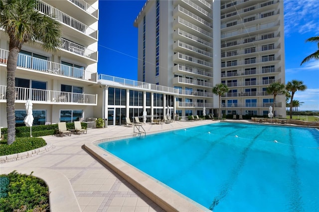 pool with a patio area