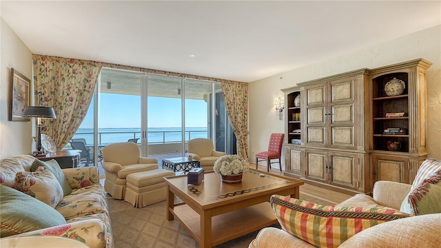 living room featuring a water view