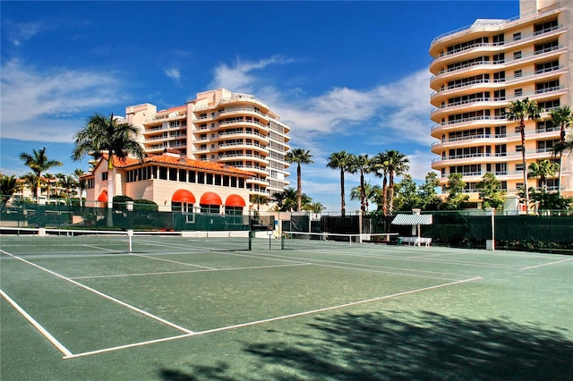 view of sport court with fence