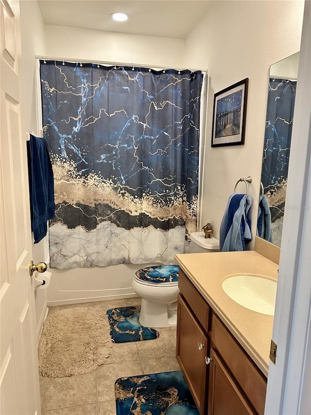 full bath with vanity, toilet, and shower / bath combo with shower curtain