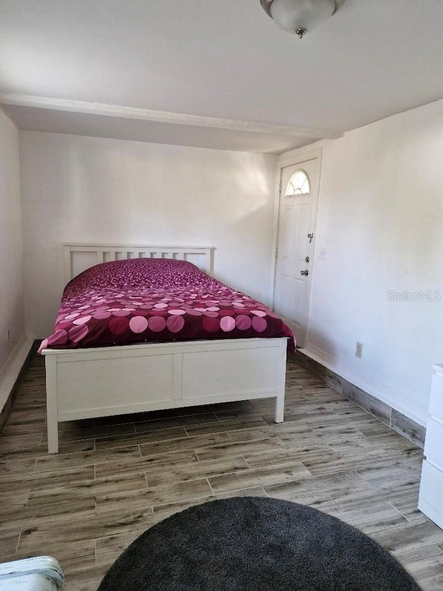 775 36th Ave S, Saint Petersburg, FL 33705 - bedroom featuring wood finished floors and baseboards
