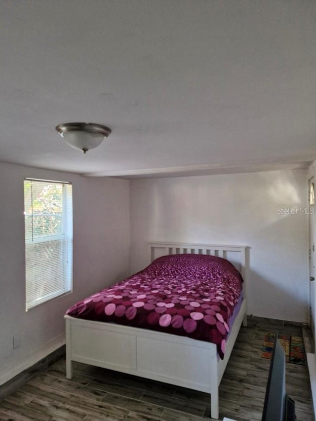 775 36th Ave S, Saint Petersburg, FL 33705 - bedroom with baseboards and wood finished floors