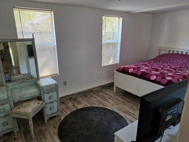 775 36th Ave S, Saint Petersburg, FL 33705 - bedroom featuring wood finished floors and baseboards