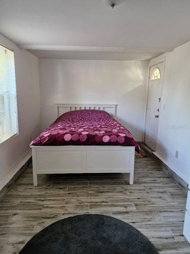 775 36th Ave S, Saint Petersburg, FL 33705 - bedroom featuring wood tiled floor and baseboards