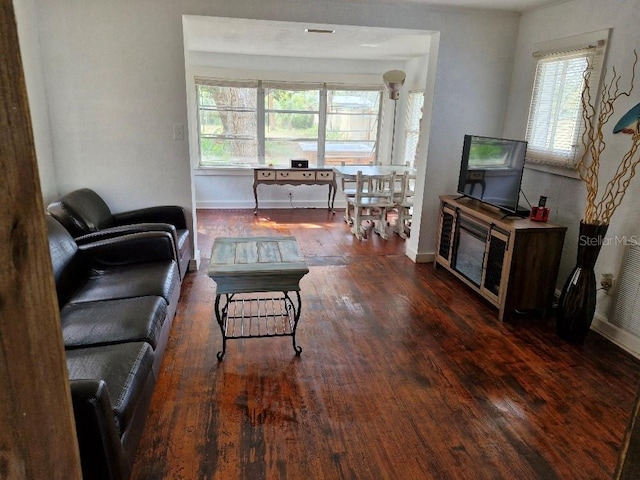 775 36th Ave S, Saint Petersburg, FL 33705 - living room featuring wood finished floors and baseboards