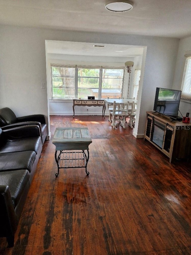 775 36th Ave S, Saint Petersburg, FL 33705 - living area with baseboards and wood finished floors