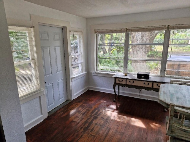 775 36th Ave S, Saint Petersburg, FL 33705 - office area featuring dark wood-style floors and baseboards